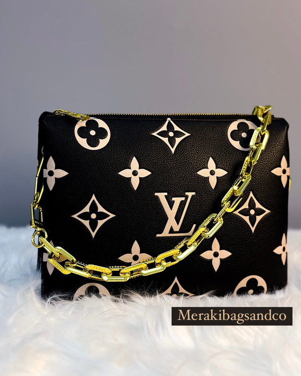 LOUIS VUITTON COUSSIN